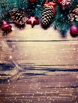 ..Christmas fir tree with decorations on wooden background...Chr