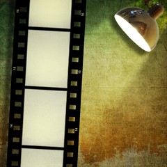 Sepia vintage film strip background and led reflector