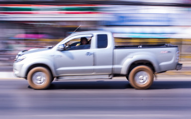 Obraz na płótnie Canvas pick-up Speeding in road