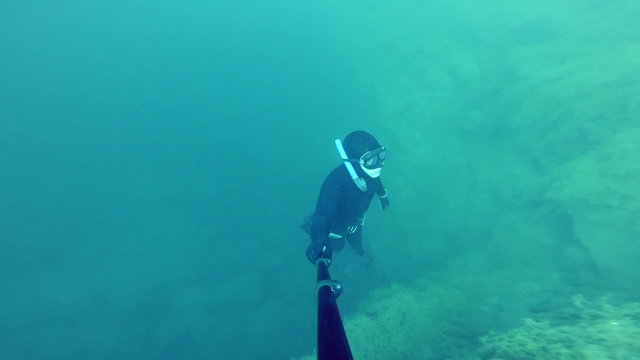 Freediver Resurfacing after a deep (20m) Dive