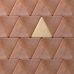 Close-up of wall made of one beige and red triangles