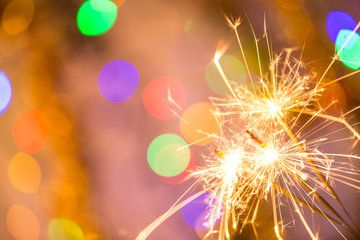 Colorful sparkler, close-up.