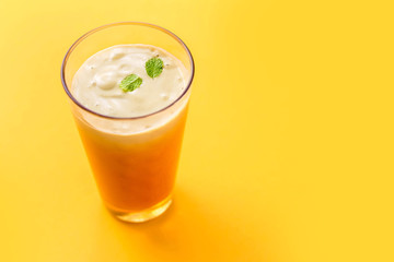 Smoothie Yoghurt With Mint on Yellow Background