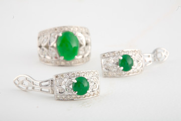 Jade and diamond set, earing and ring isolated on white backgrou