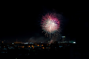 Brightly colorful fireworks and salute of various colors in the