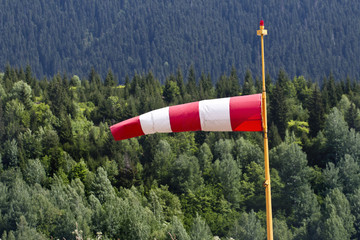 one windsock pole red and white