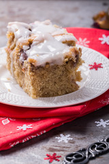 Plum cake in white icing for Christmas and New year