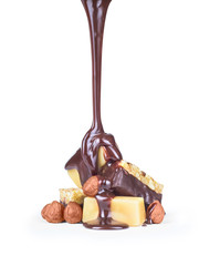 Composition of chocolate and hazelnut isolated on white