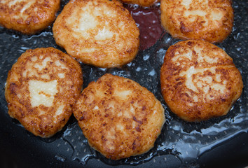 cheese pancakes fried in oil