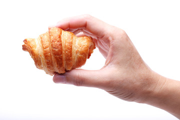 hand showing croissant isolated on white background