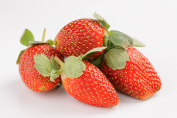 group of strawberries on white background