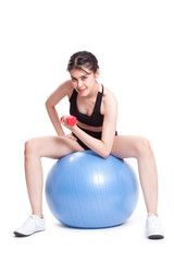 Fototapeta na wymiar Fitness woman sport training with exercise ball and lifting weights