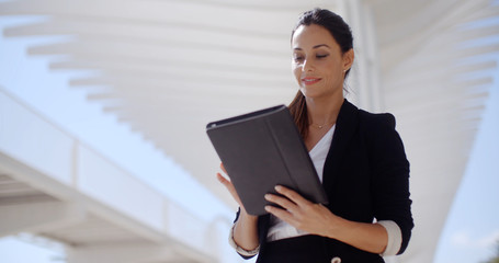 Elegant businesswoman on a seafront promenade