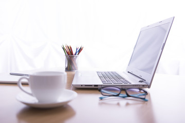 Fototapeta premium Office desk selective focus on laptop keyboard