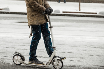 Obraz premium A man on a scooter