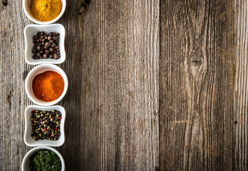 spices in bowls in horizontal row