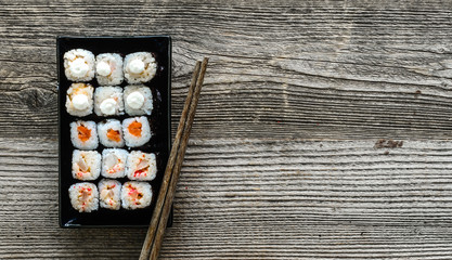 assorted sushi on black plate