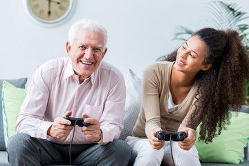 Senior playing on the console