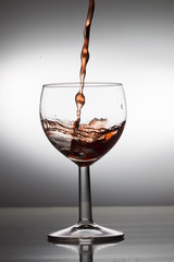 Wine pouring into a glass