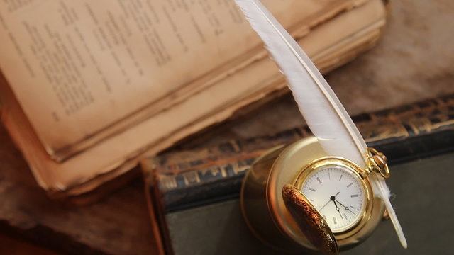education idea, inscription on the label "education", gold pocket watch and textbook