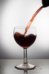 Wine pouring into a glass