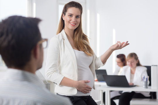 Pregnant businesswoman during business appointment