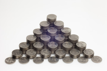 A lot of thai coins are arranged in an orderly manner .