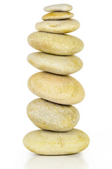 Fototapeta na wymiar Balanced stack of different stones on white
