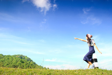 Fototapeta premium girl pointing at the sky