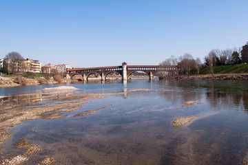 Fototapeta na wymiar Pavia, covered bridge over the river Ticino