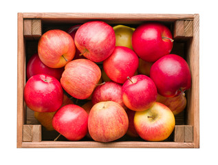 red apples in wooden box