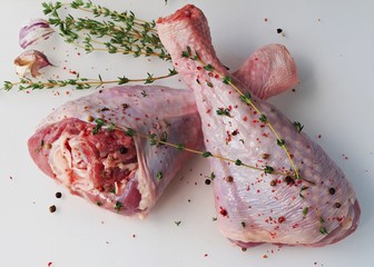 raw turkey drumstick with thyme