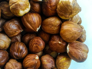 Raw shelled hazelnuts close up