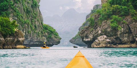 Trip on colourful kayak
