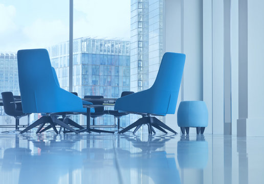 Small seat and modern blue office arm chairs in open space boardroom
