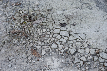 Pavimento di cemento danneggiato, sgretolato, trama