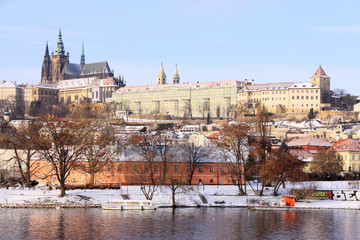 Christmas snowy Prague gothic Castle above River Vltava, Czech Republic