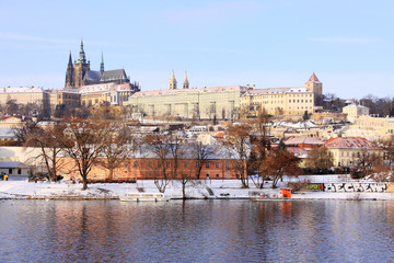 Fototapeta na wymiar Christmas snowy Prague gothic Castle above River Vltava, Czech Republic