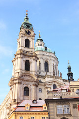 Fototapeta na wymiar Christmas snowy Prague St. Nicholas' Cathedral, Czech Republic
