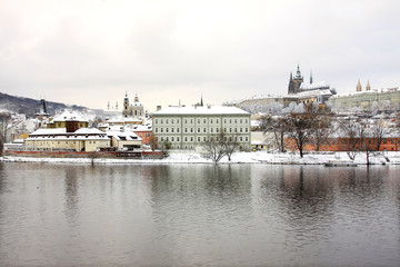 Christmas snowy Prague gothic Castle above River Vltava, Czech Republic