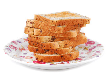 bread on plate isolated on white