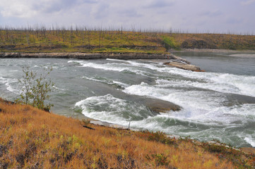 Turbulent rapids on the river.