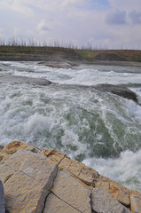 Turbulent rapids on the river.
