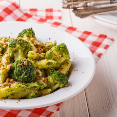 Broccoli pasta with sauce of green peas.