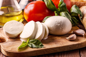 Mozzarella, tomatoes, garlic and basil.