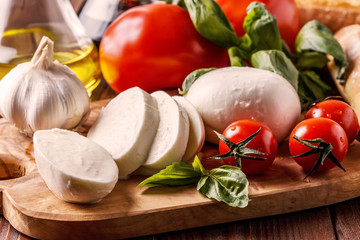 Mozzarella, tomatoes, garlic and basil.