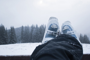 Legs skier in ski boots