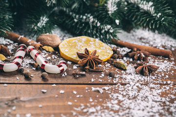 Beautiful Christmas wooden background with snow fir tree. View with copy space