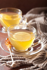 hot lemon ginger tea in glass cup