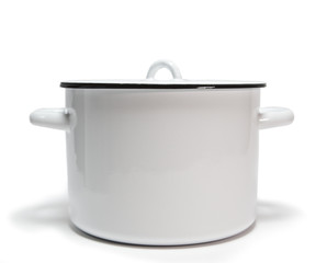 The white enameled pan on a white background